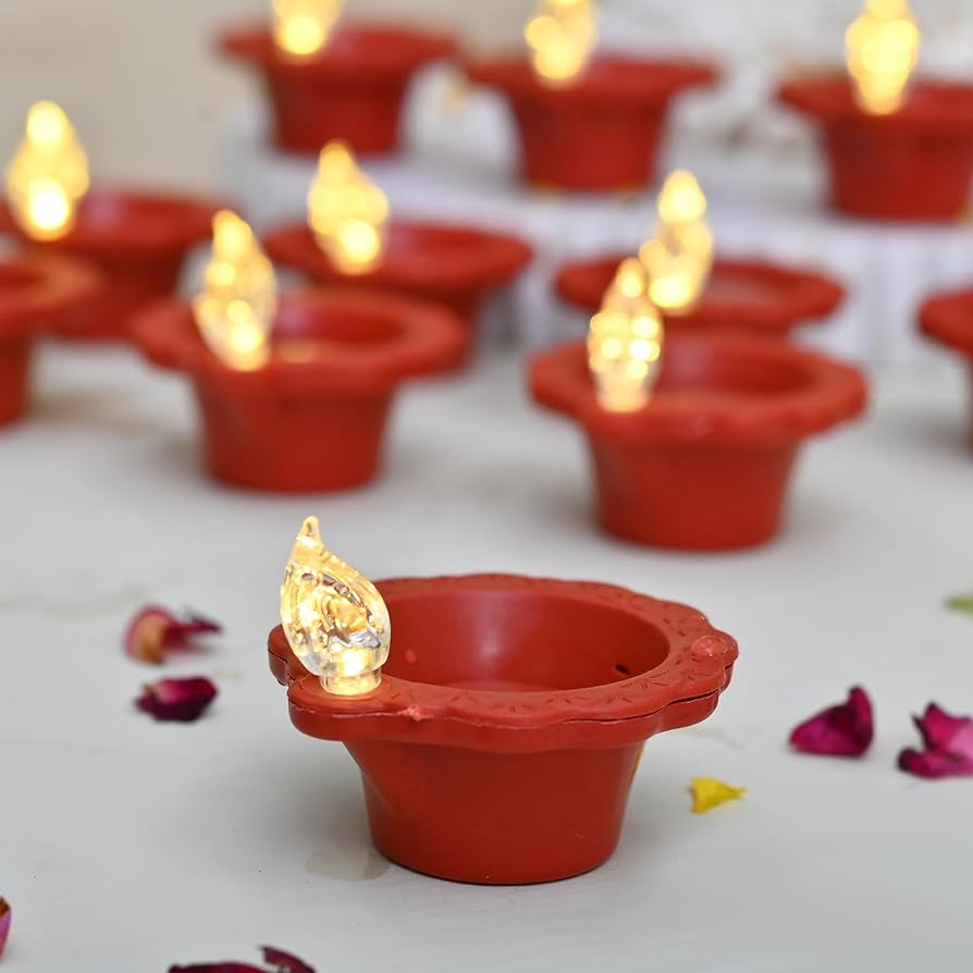 Diwali Decoration Combo Set – Water LED Sensor Diyas, Blue Tealight Candles, Peacock Welcome Rangoli & Diamond Bubble Lights