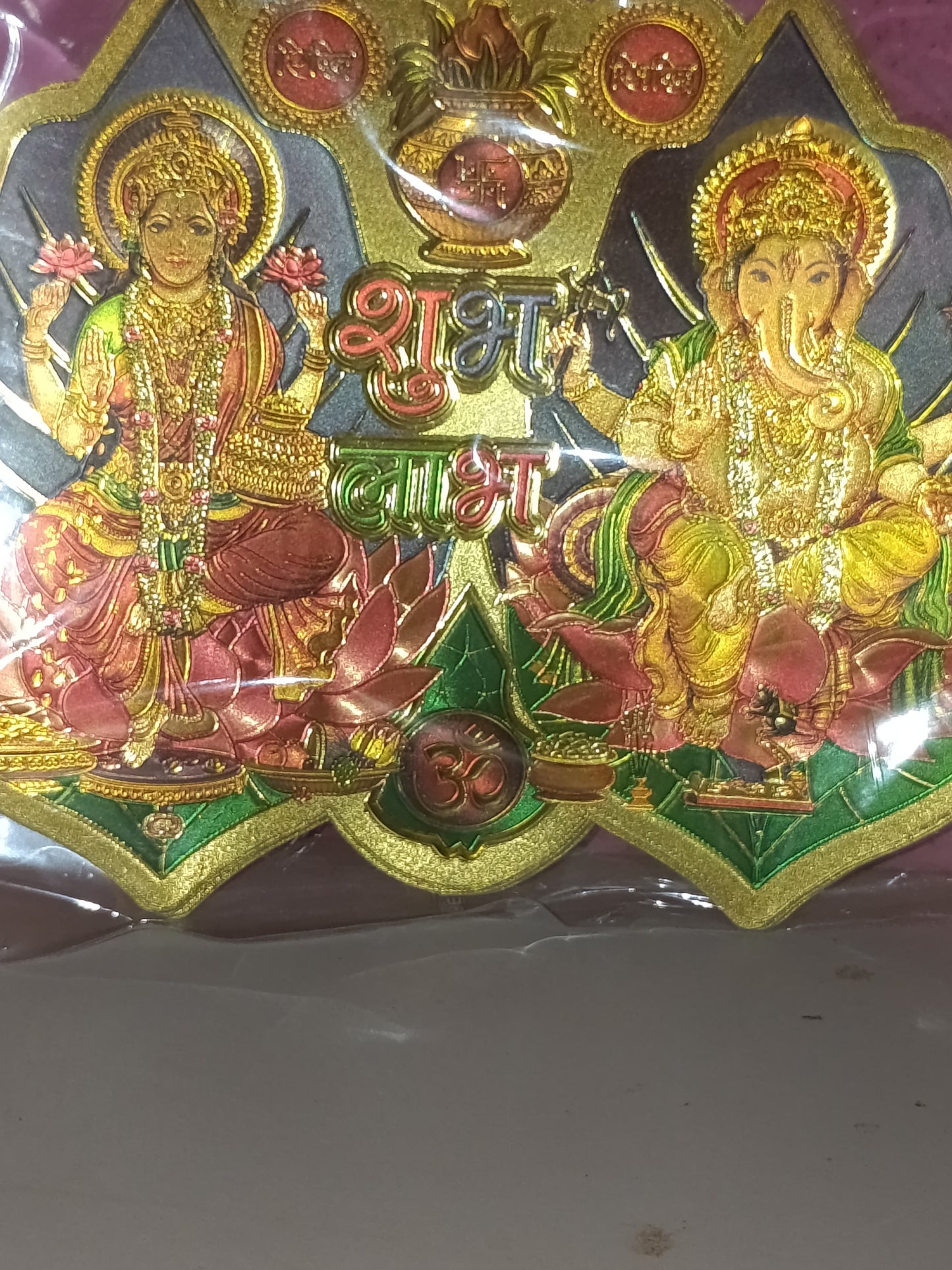 Metallic sticker featuring the deities Lakshmi and Ganesha 1pcs