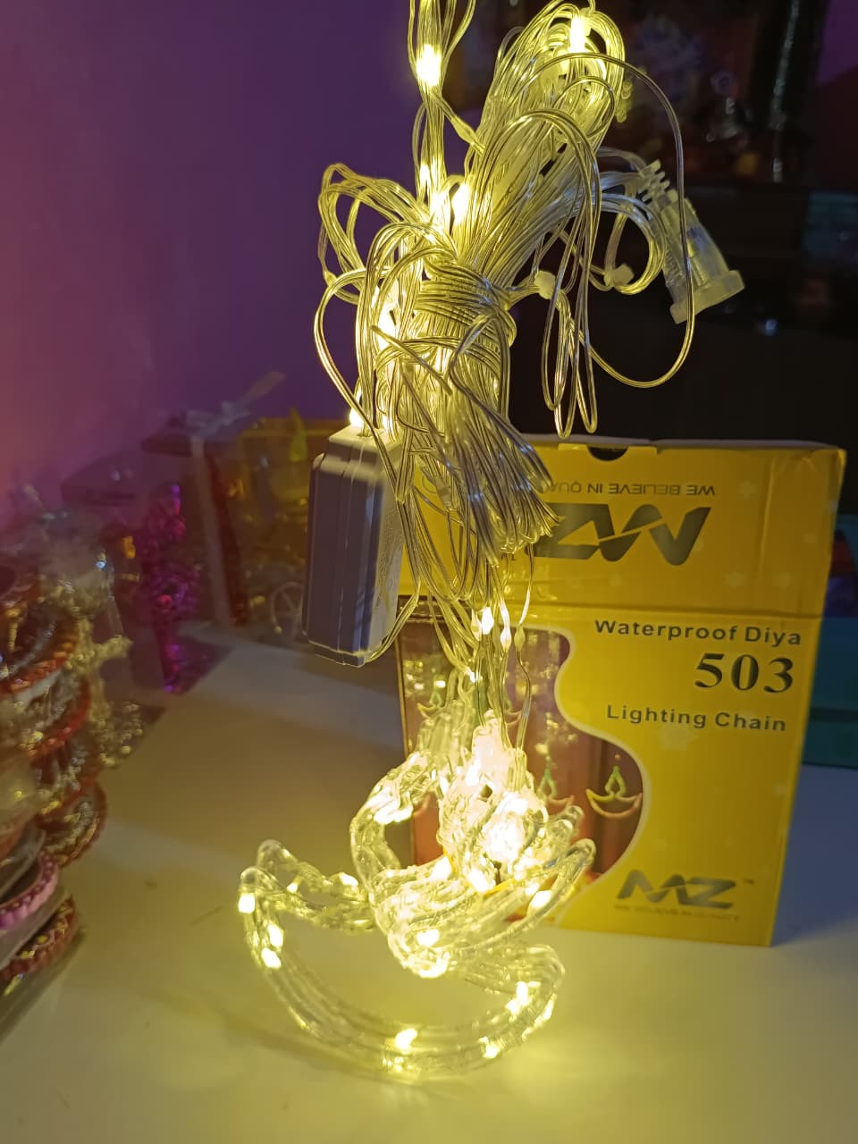 Desidiya Warm White Diya/Diwali Light Curtain, Led String Copper Lights with Pack of 12 Hanging Diyas, 8 Flashing Modes, Decoration, Prong Base, 2.5 Meters